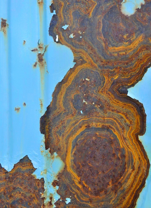 Rust-patching-on-blue-chair